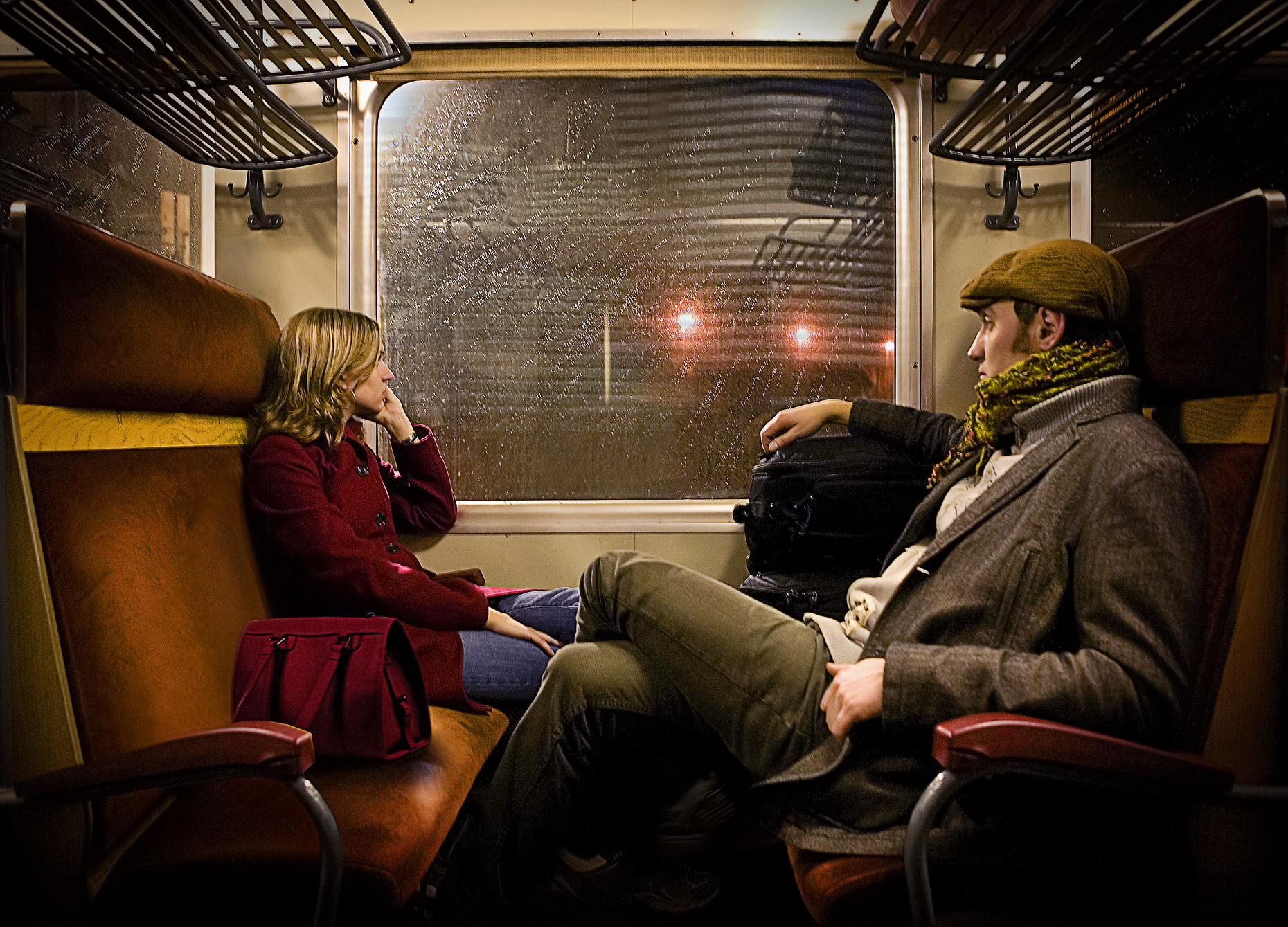 Assurant couple on train, Andy Goodwin Photography